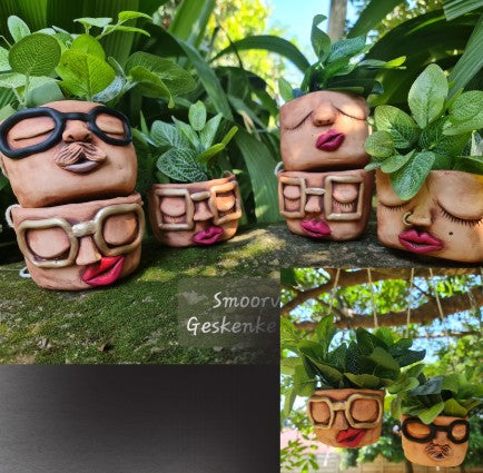 Gang blom pot met gesig